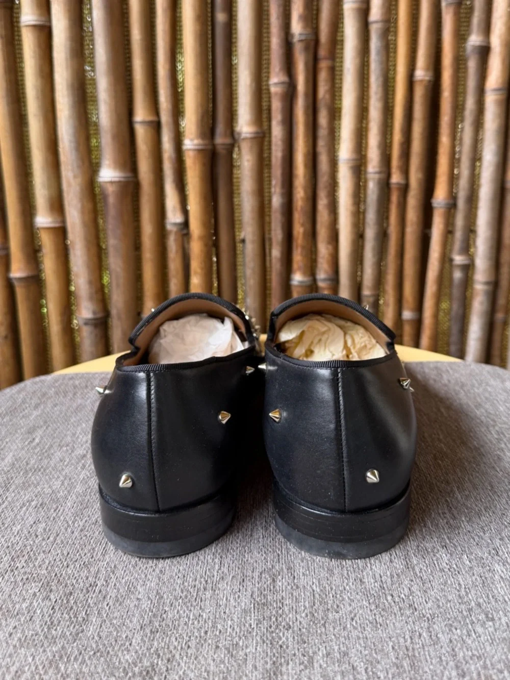 CHRISTIAN LOUBOUTIN men’s spiked leather loafers.
